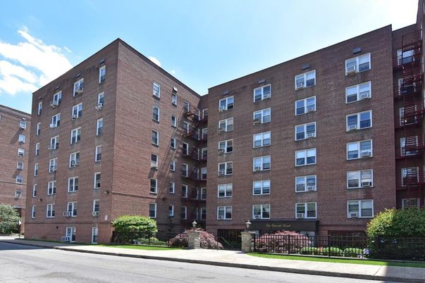 Exterior, Facade, Brick Facade, Condo Building