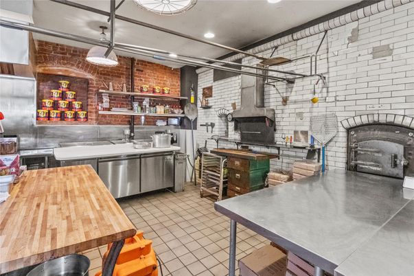 Interior, Kitchen, Recessed Lighting, Stainless Steel Appliances, Stone Walls