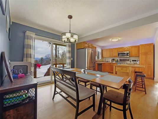 Dining room, Interior, Kitchen, Pendant Lights, Stainless Steel Appliances, Wood Texture Flooring