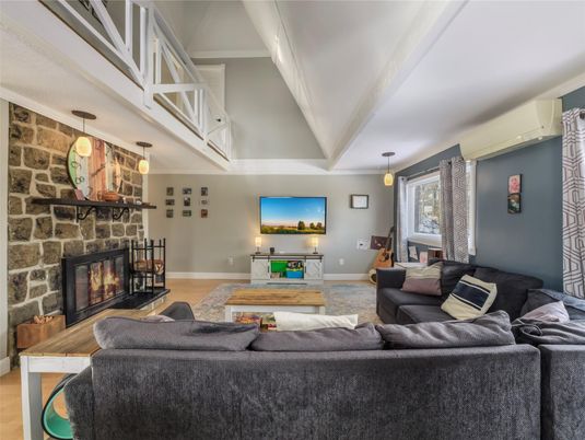 Fireplace, Interior, Living room, Pendant Lights, Stone Walls, Wood Texture Flooring