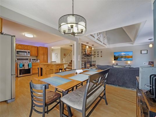 Dining room, Interior, Kitchen, Living room, Pendant Lights, Stainless Steel Appliances, Wood Texture Flooring