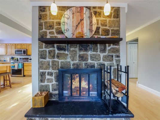 Fireplace, Interior, Kitchen, Pendant Lights, Stone Walls, Wood Texture Flooring