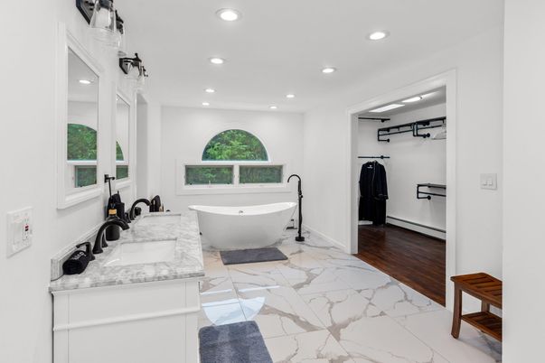 Bathroom, Dual Sink Vanities, Free Standing Baths, Interior, Marble, Recessed Lighting, Wood Texture Flooring