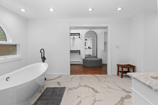 Bathroom, Free Standing Baths, Interior, Marble, Recessed Lighting, Wood Texture Flooring