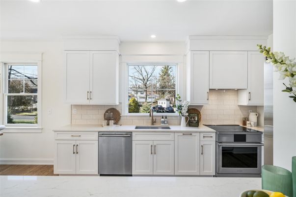 Interior, Kitchen, Marble, Recessed Lighting, Stainless Steel Appliances, Wood Texture Flooring