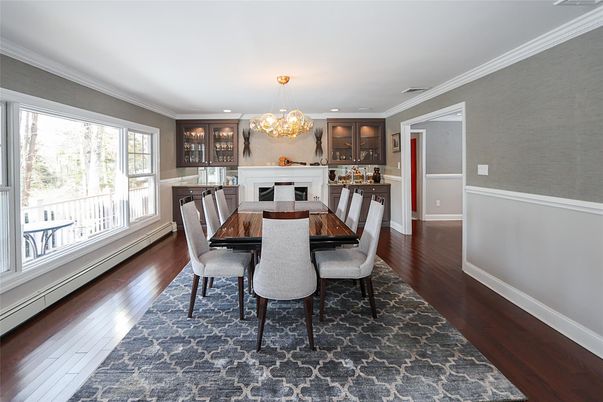 Chandelier, Dining room, Fireplace, Interior, Kitchen, Recessed Lighting, Wood Texture Flooring