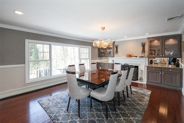 Chandelier, Dining room, Fireplace, Interior, Recessed Lighting, Wood Texture Flooring