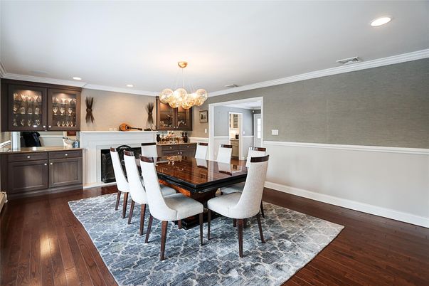 Chandelier, Dining room, Fireplace, Interior, Recessed Lighting, Wood Texture Flooring