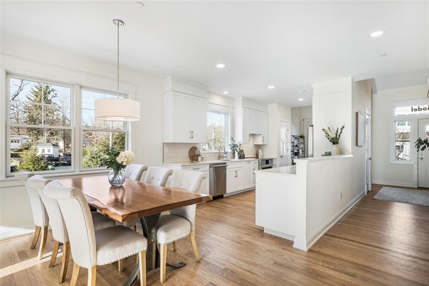 Dining room, Interior, Kitchen, Pendant Lights, Recessed Lighting, Stainless Steel Appliances, Wood Texture Flooring