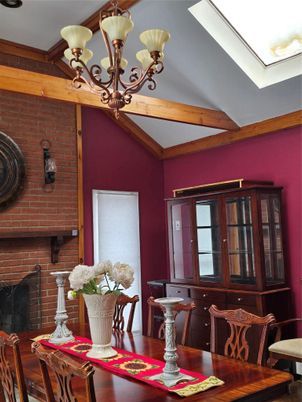 Chandelier, Dining room, Fireplace, Interior, Stone Walls, Wooden Beams, Wood Texture Flooring