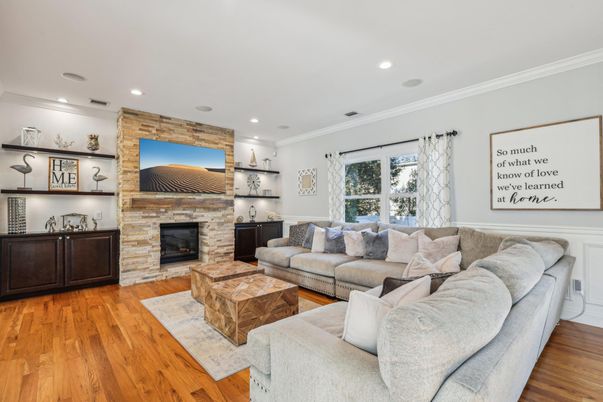 Fireplace, Interior, Living room, Recessed Lighting, Stone Walls, Wood Texture Flooring
