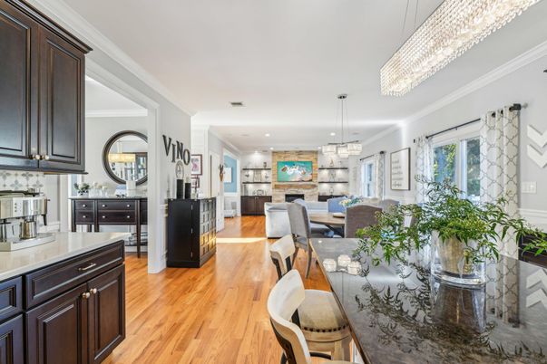Chandelier, Dining room, Fireplace, Interior, Kitchen, Living room, Pendant Lights, Recessed Lighting, Wood Texture Flooring