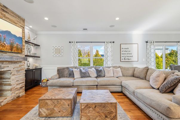 Fireplace, Interior, Living room, Recessed Lighting, Stone Walls, Wood Texture Flooring