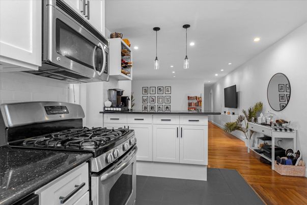 Interior, Kitchen, Pendant Lights, Recessed Lighting, Stainless Steel Appliances, Wood Texture Flooring
