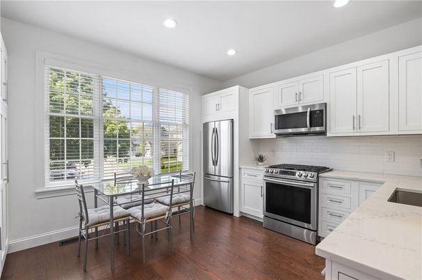 Dining room, Interior, Kitchen, Recessed Lighting, Stainless Steel Appliances, Wood Texture Flooring