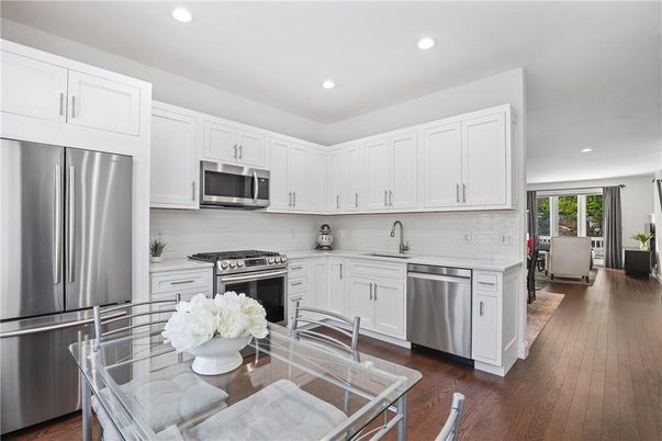 Interior, Kitchen, Recessed Lighting, Stainless Steel Appliances, Wood Texture Flooring