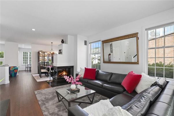 Dining room, Fireplace, Interior, Living room, Pendant Lights, Recessed Lighting, Wood Texture Flooring
