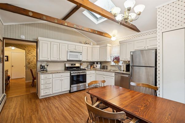 Chandelier, Dining room, Interior, Kitchen, Stainless Steel Appliances, Wooden Beams, Wood Texture Flooring