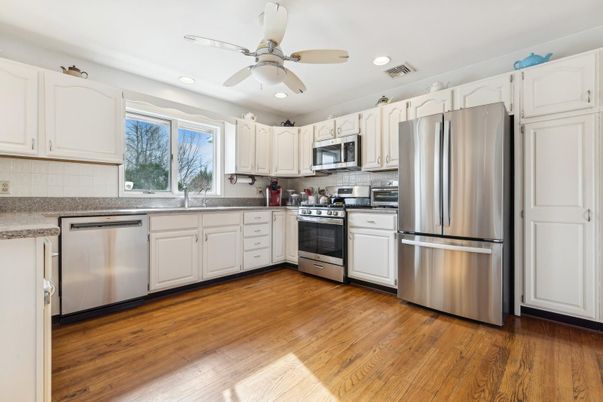 Interior, Kitchen, Recessed Lighting, Stainless Steel Appliances, Wood Texture Flooring