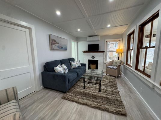 Fireplace, Interior, Living room, Recessed Lighting, Wood Texture Flooring
