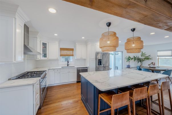 Dining room, Interior, Kitchen, Pendant Lights, Recessed Lighting, Stainless Steel Appliances, Wood Texture Flooring