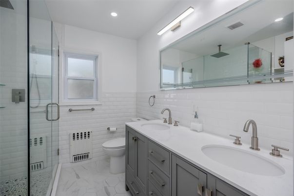 Bathroom, Dual Sink Vanities, Glass Shower, Interior, Marble, Recessed Lighting