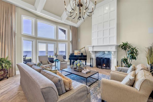 Chandelier, Fireplace, Interior, Living room, Piano, Water, Wood Texture Flooring