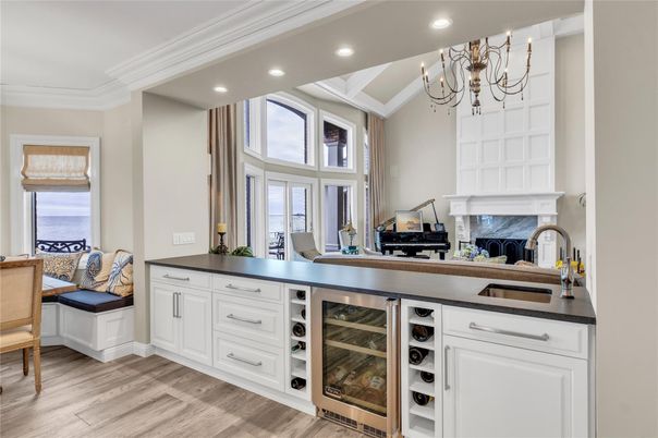 Chandelier, Fireplace, Interior, Kitchen, Recessed Lighting, Wood Texture Flooring