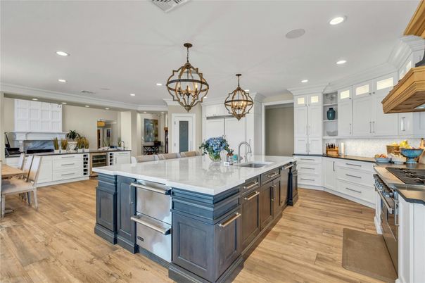Chandelier, Dining room, Interior, Kitchen, Pendant Lights, Recessed Lighting, Stainless Steel Appliances, Wood Texture Flooring