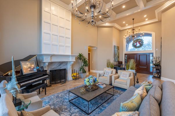 Chandelier, Fireplace, Interior, Living room, Piano, Recessed Lighting, Wood Texture Flooring