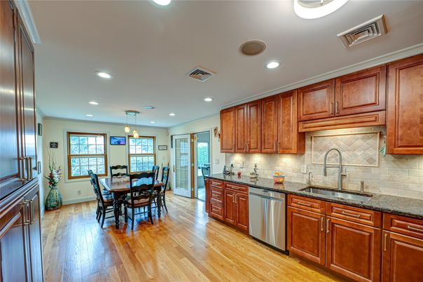 Dining room, Interior, Kitchen, Pendant Lights, Recessed Lighting, Stainless Steel Appliances, Wood Texture Flooring
