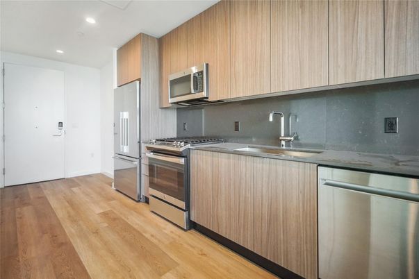Interior, Kitchen, Recessed Lighting, Stainless Steel Appliances, Wood Texture Flooring