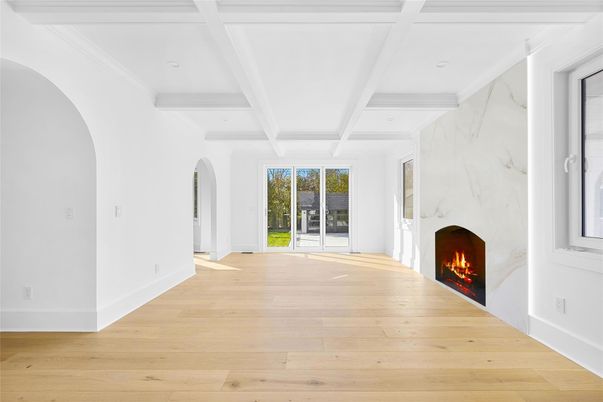 Empty room, Fireplace, Interior, Marble Walls, Recessed Lighting, Wood Texture Flooring
