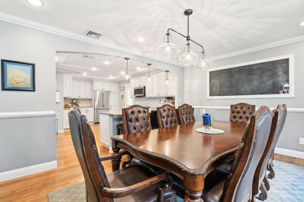 Dining room, Interior, Kitchen, Pendant Lights, Recessed Lighting, Stainless Steel Appliances, Wood Texture Flooring