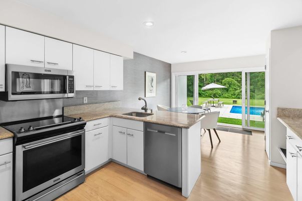 Dining room, Interior, Kitchen, Recessed Lighting, Stainless Steel Appliances, Wood Texture Flooring