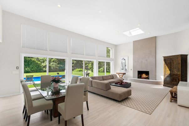 Dining room, Fireplace, Interior, Living room, Recessed Lighting, Wood Texture Flooring
