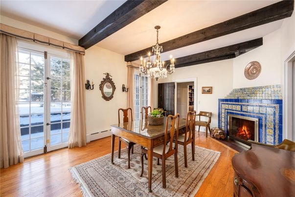 Chandelier, Dining room, Fireplace, Interior, Wooden Beams, Wood Texture Flooring