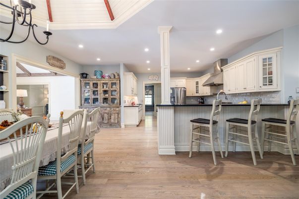 Dining room, Interior, Kitchen, Recessed Lighting, Stainless Steel Appliances, Wood Texture Flooring