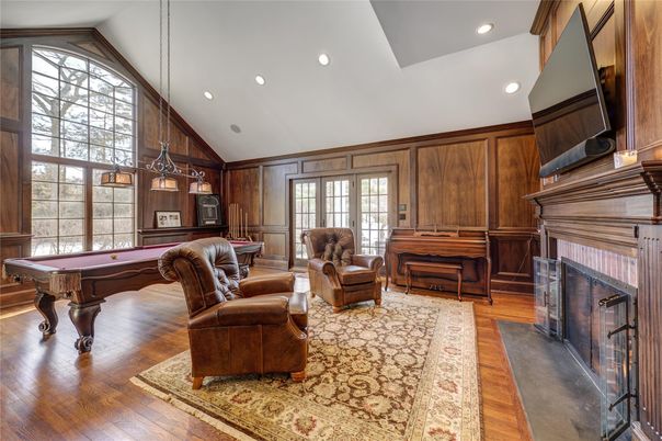 Billiard Table, Fireplace, Game Room, Interior, Living room, Pendant Lights, Piano, Recessed Lighting, Wood Texture Flooring, Wooden Walls