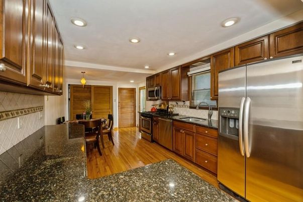 Dining room, Interior, Kitchen, Pendant Lights, Recessed Lighting, Stainless Steel Appliances, Wood Texture Flooring