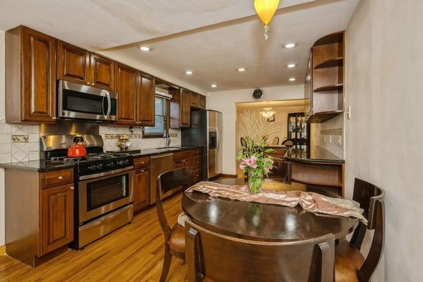Dining room, Interior, Kitchen, Recessed Lighting, Stainless Steel Appliances, Wood Texture Flooring