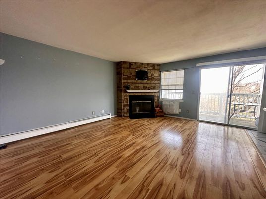 Empty room, Fireplace, Interior, Stone Walls, Wood Texture Flooring