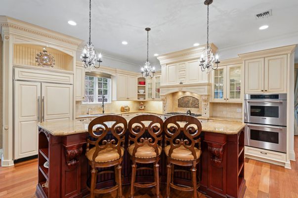 Chandelier, Interior, Kitchen, Pendant Lights, Recessed Lighting, Stainless Steel Appliances, Wood Texture Flooring