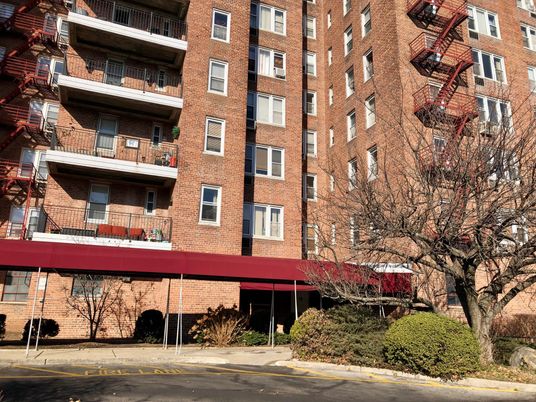 Exterior, Facade, Brick Facade, Condo Building