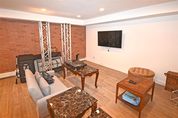 Interior, Living room, Recessed Lighting, Stone Walls, Wood Texture Flooring