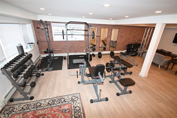 Fitness Equipment, Interior, Recessed Lighting, Stone Walls, Wood Texture Flooring