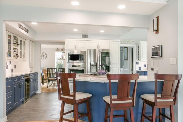 Dining room, Interior, Kitchen, Recessed Lighting, Stainless Steel Appliances, Wood Texture Flooring