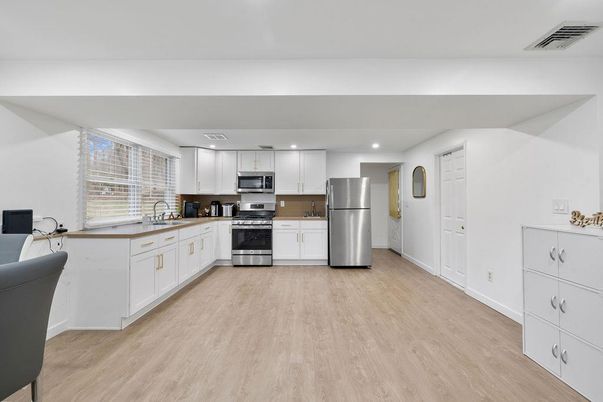 Interior, Kitchen, Recessed Lighting, Stainless Steel Appliances, Wood Texture Flooring