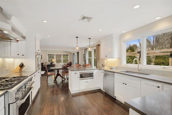 Dining room, Interior, Kitchen, Pendant Lights, Recessed Lighting, Stainless Steel Appliances, Wood Texture Flooring
