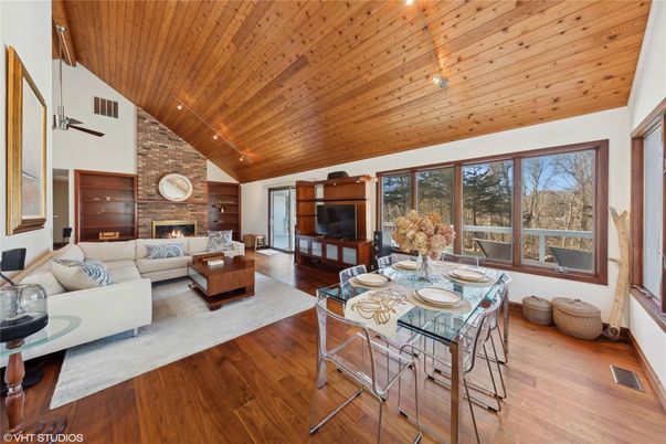 Dining room, Fireplace, Interior, Living room, Stone Walls, Wooden Ceilings, Wood Texture Flooring